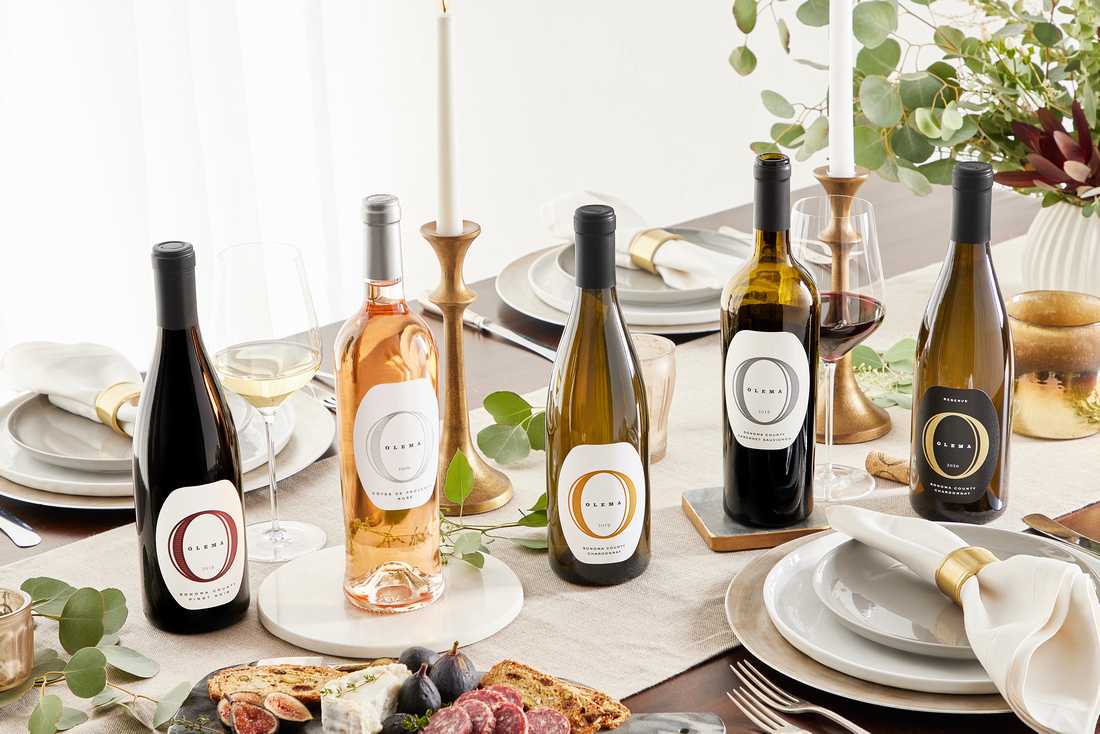 Olema wine bottles on a holiday table